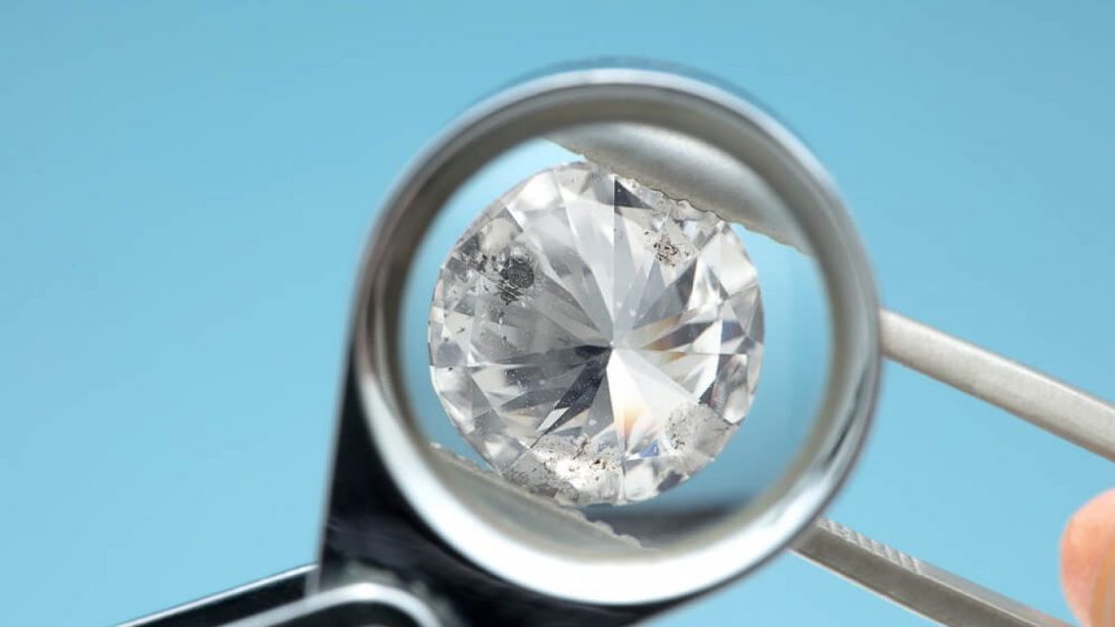 Skilled hands maintaining your enhanced diamond