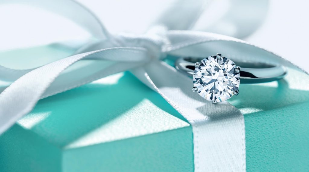 An engagement  ring and a pretty box.