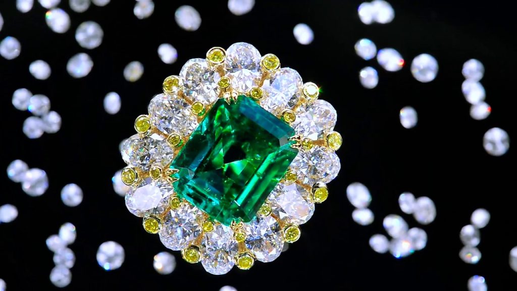 Precious green diamond surrounded by white diamonds