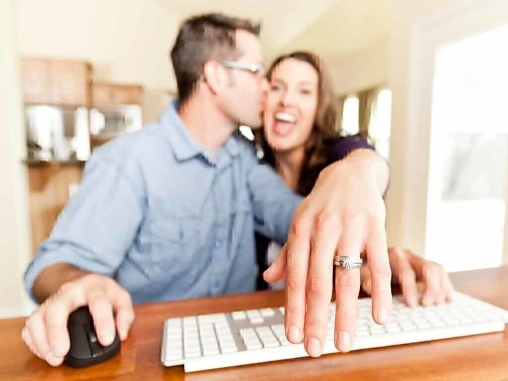 A couple checking diamond information online