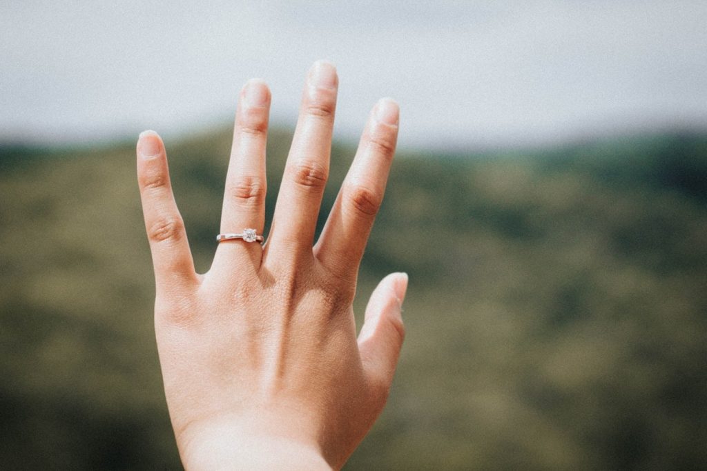 Newly-engaged woman happy with her ring